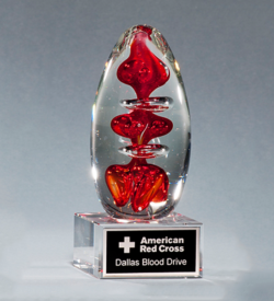 Egg-Shaped Red Art Glass Award on Clear Glass Base