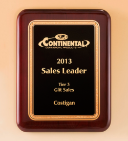 Gold florentine border with textured black center on rosewood piano-finish plaque