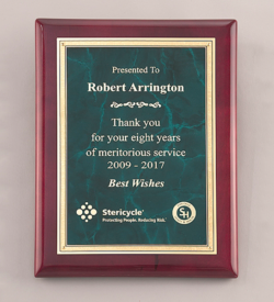 Emerald marble plate with gold florentine border on rosewood piano-finish plaque